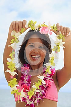 Polynesian girl with flower lei