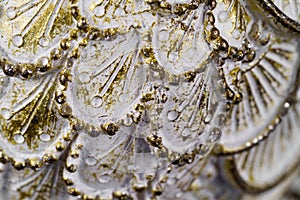 Polystone resin statue of owl feathers. Close up macro shot .