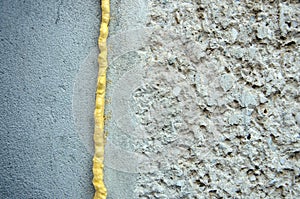 Polyurethane foam filled crack in the wall