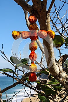 Pom-pom covered cross, Playa Las Cuevas, Sayulita, Nayarit, Mexico photo