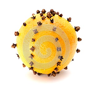 Pomander ball made of orange and dried cloves 