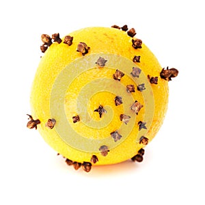 Pomander ball made of orange and dried cloves 