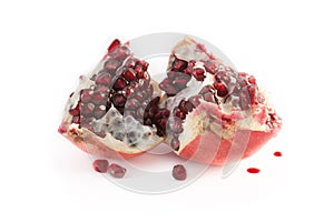 Pomegranate broken isolated on white