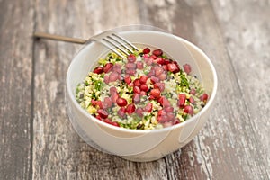 Pomegranate cauliflower couscous bowl