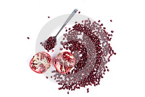 Pomegranate fruits and seeds on whit ebackground