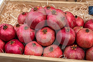 Pomegranate fruits. A vegetable counter at a street market.