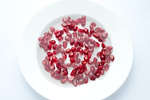 pomegranate grains on a plate