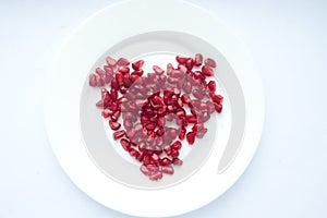 pomegranate grains on a plate