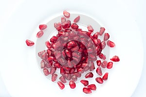 pomegranate grains on a plate