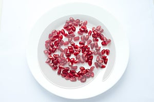 pomegranate grains on a plate