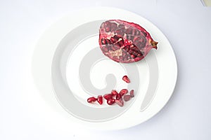 pomegranate grains on a plate