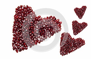 Pomegranate hearts on a white background. Valentine`s card