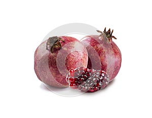 Pomegranate isolated on white background. Sweet and juicy garnet with copy space for text. Garnets isolated on white.