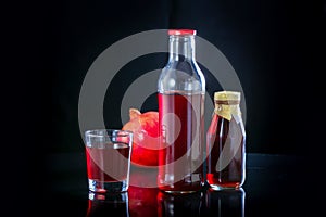 Pomegranate juice with fresh pomegranate fruit