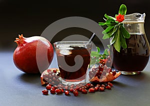 Pomegranate juice, fruit, seeds, branches.