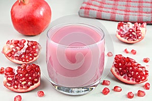 Pomegranate juice in a glass cup