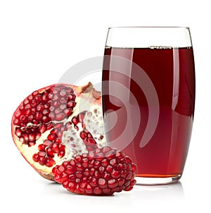 Pomegranate juice in a glass and ripe pomegranate
