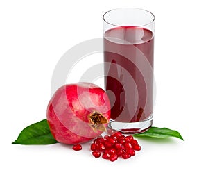 Pomegranate juice in a glass and ripe pomegranate