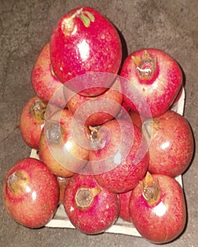 Pomegranate, Punica granatum, fruits on display. photo