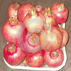 Pomegranate, Punica granatum, fruits on display. photo