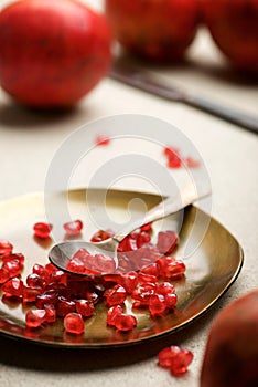 Pomegranate seeds in a metal tray