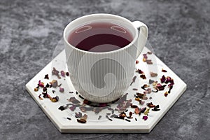 Pomegranate tea on a dark background. photo