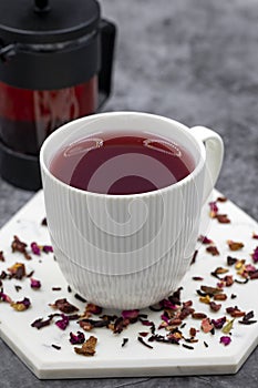 Pomegranate tea on a dark background. photo
