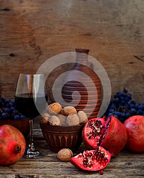 Pomegranate, walnuts, grapes and wine