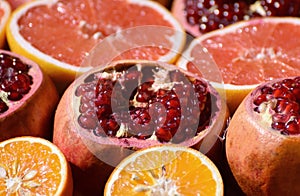 Pomegranates and oranges. Fresh fruits