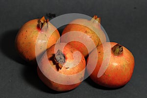 Pomegranates on the texture background