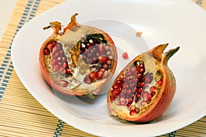 Pomegranates on white dish
