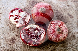 Pomegranats on the old surfase