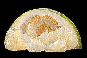 Pomelit fruit on black