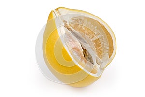 Pomelo fruit with cut out piece on a white background