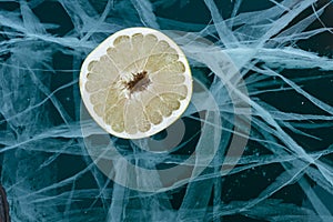 Pomelo fruit on ice.