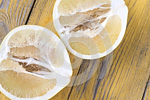 Pomelo on the wooden table