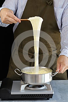 Pommes Aligot, Stretchy dish mixed with cheese Tomme fraÃ®che de l`Aubrac  and mashed potatoes