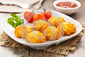 Pommes duchesse - potato croquettes photo