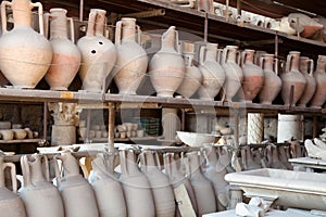 Pompeii antique pottery jugs. photo