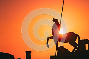 Pompeii, Italy. Statue Of Centaur On Territory Of Forum On Background Sunset Sunrise Sky