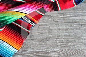 Poncho background Mexican serape Mexico cinco de mayo fiesta wooden copy space photo