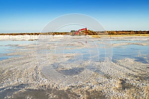 A pond full of salt after evaporation of ocean water at salines in Algarve, Portugal