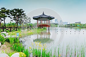 The pond and Korean traditional pavilion at Hanbat Arboretum in Daejeon, Korea