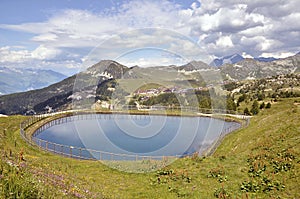 Pond in the mountains of La Plagne in France photo