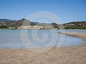 Pond of Notteri in Villasimius and in the background the tourist