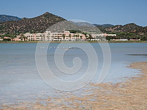 Pond of Notteri in Villasimius and in the background the tourist