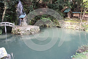 pond and outdoor altars in a park in izumo (japan)