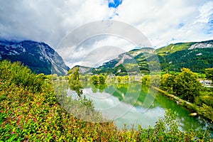 Pond with the surrounding nature and mountains near Trautenfels Castle near Liezen