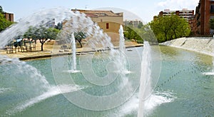 Pond with water jets in the Park gardens Nou Barris, Barcelona