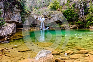 Pond of water and little waterfall